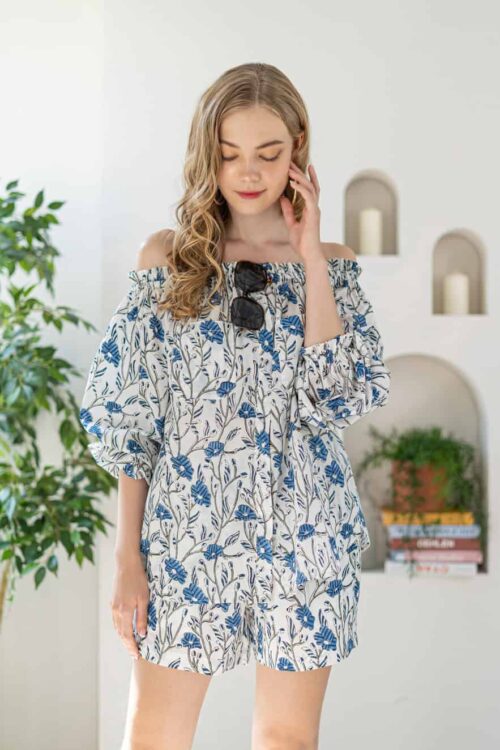 Shoulder floral dress with carrot print, perfect for casual summer wear.