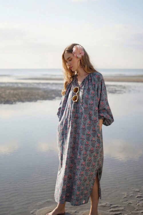 Season beach dress with floral pattern and comfortable fit.