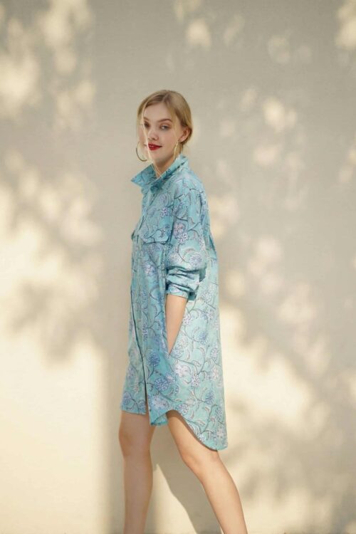 Elegant blue patterned dress with a relaxed fit, perfect for casual outings and comfortable style.