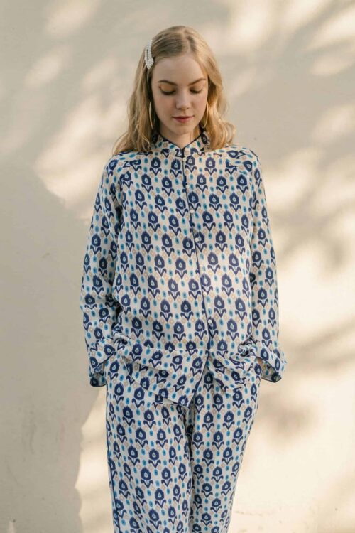 Comfortable blue and white patterned pajama set for relaxed lounging.