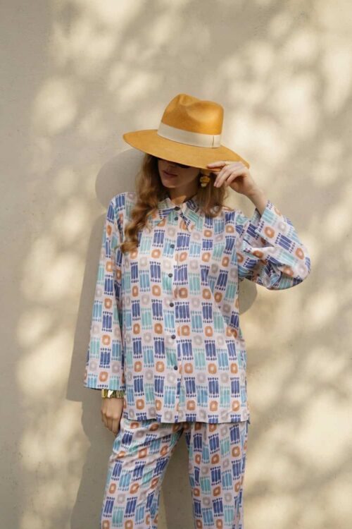 Patterned pajamas for relaxing at home.